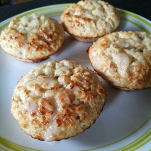 Lemon Drizzle Baked Oats - 4 muffin style oat cakes on a plate