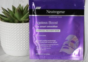 March 19 Glossybox - Purple Neutrogena Facemask leaning against a succulent in a white textured pot