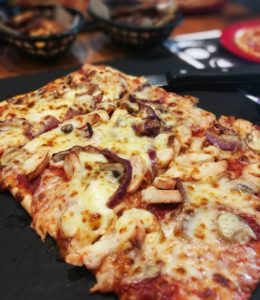 Dieting Myths - a rectangular meat feast pizza 