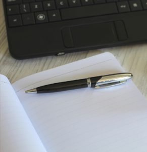 The First Year Of High School - A black and silver pen on a writing pad.