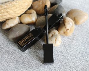 July 19' Glossybox - a black mascara with the wand resting on the bottle