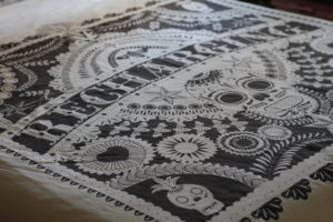 How to get a better night's sleep - Black and white bedcovers with tattoo style writing and sugar skulls