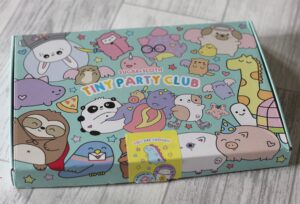 Sugar & Sloth Tiny Party Club box -A bright box covered in cute animal cartoons